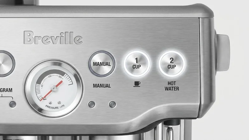 Close-up of Breville control panel highlighting the 1 CUP and 2 CUP buttons