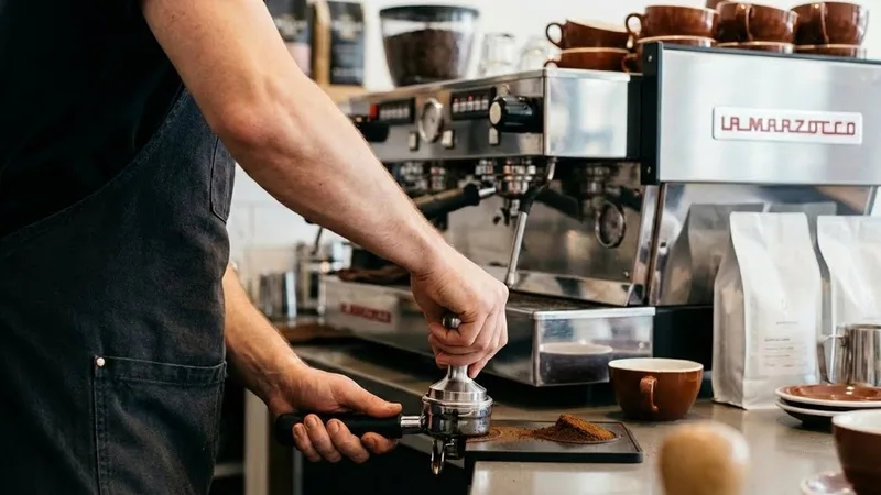 Side view showing an uneven tamp where one side of the coffee puck is higher than the other in the portafilter